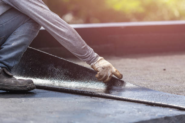Professional Emergency Waterproofing technician working in Oswego, NY